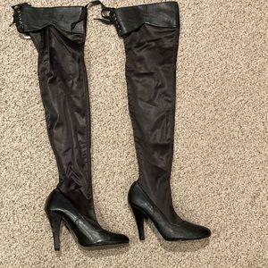 Thigh high, high heeled boots